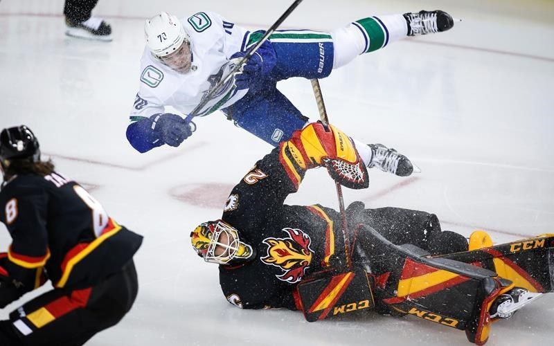 Boeser's three-point night paces Canucks to 5-1 win over Flames