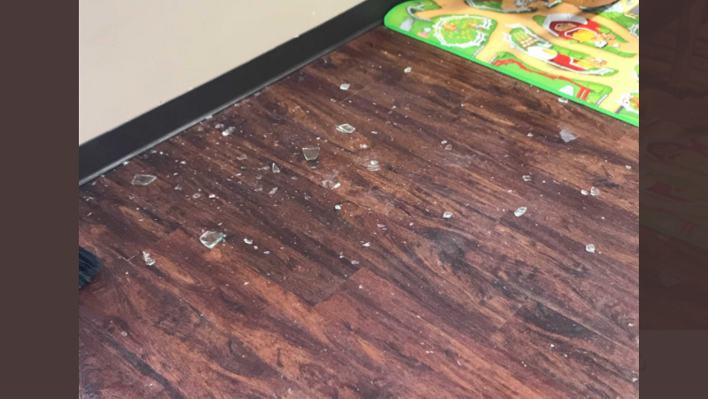 Rock thrown through window of education minister's office