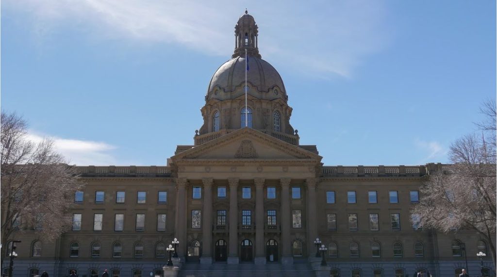 Alberta legislature building is shown.
