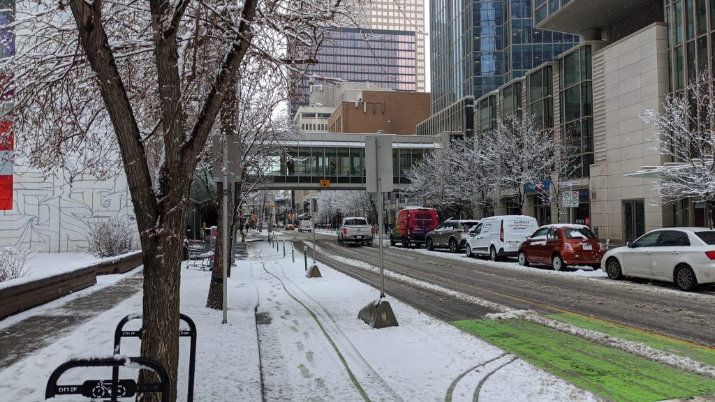 Snow covers 8 Avenue SW in Calgary