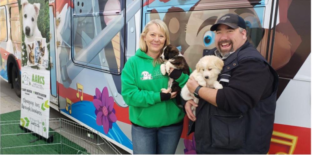 A Puppy bus is showcased at the Anderson C-train in Calgary