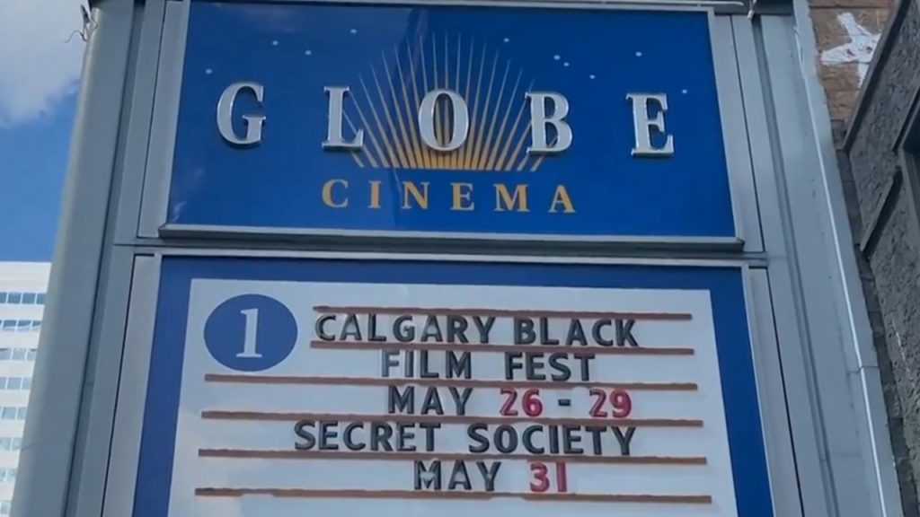 Globe Cinema billing sign