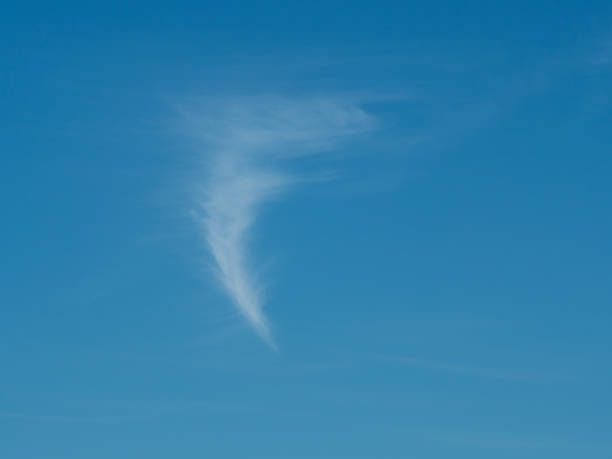 A little tornado cloud and blue sky in springtime.