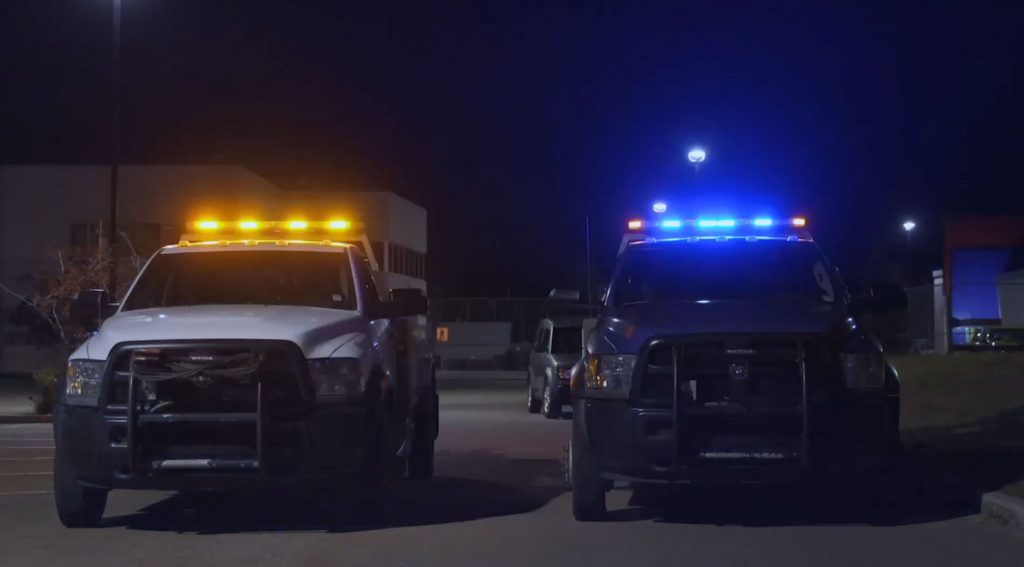 Blue lights on tow trucks as part of the Alberta pilot project are shown.