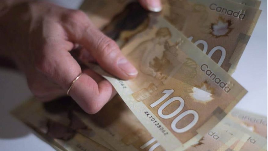 a picture of Canadian $100 bills