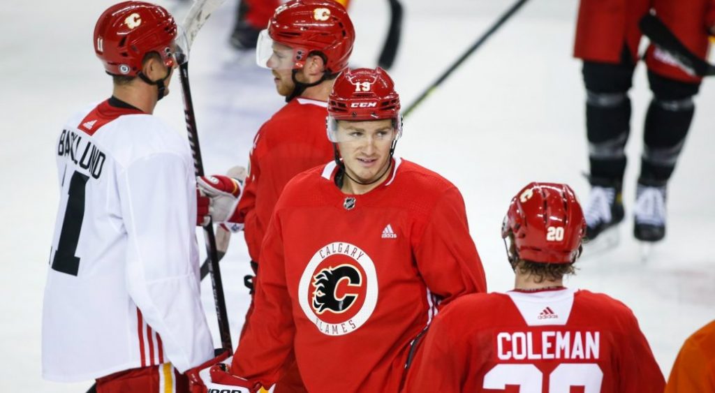 Matthew Tkachuk is pictured centre among other players of the Calgary Flames while on the ice for training camp