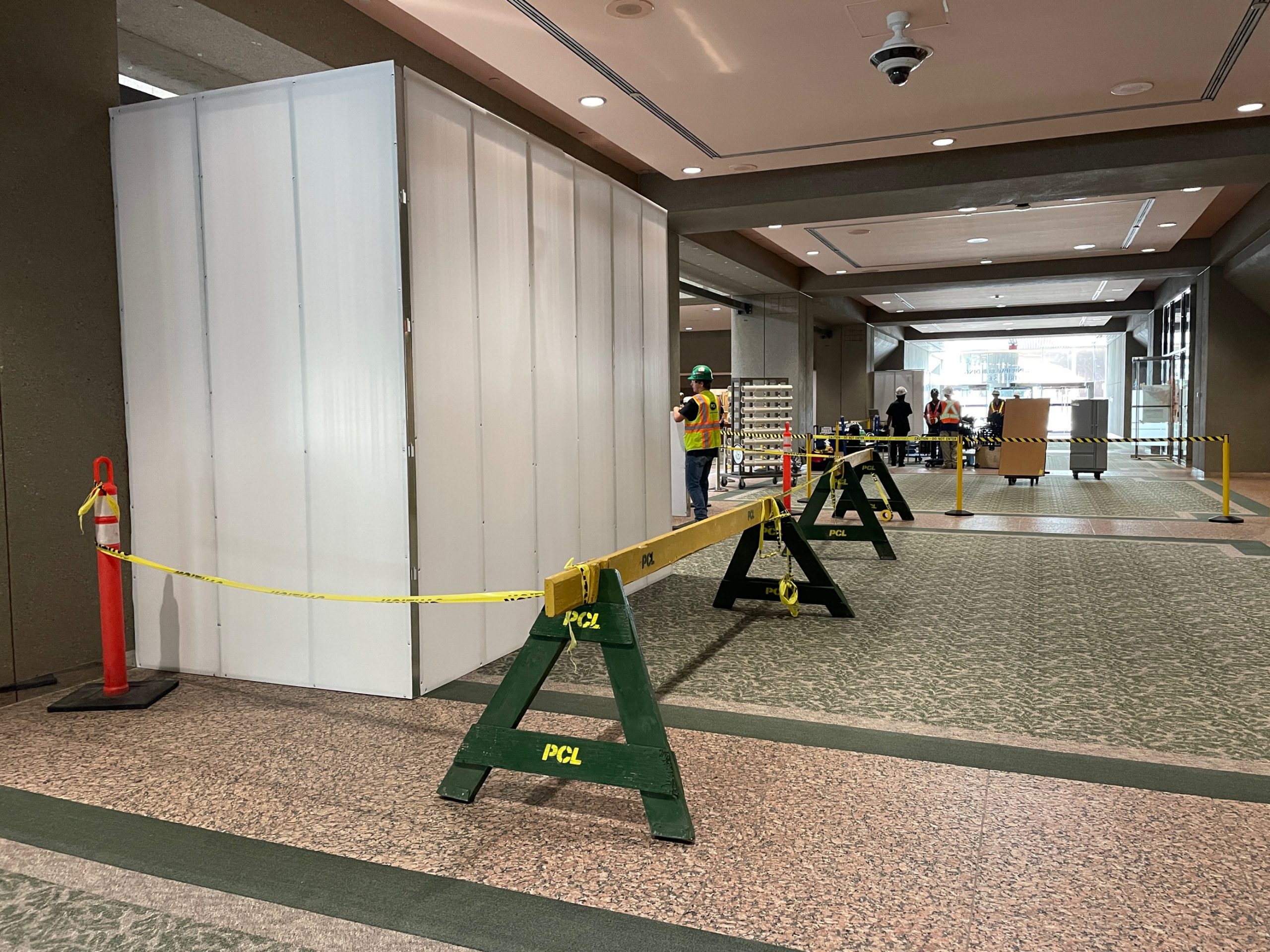 Police tape surrounds damaged areas inside City Hall in Calgary