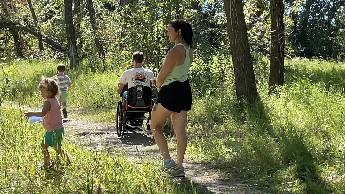 Terry Tenove and his family hiking at Douglasbank Park in Calgary