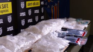 Large bags of methamphetamine and fentanyl, along with a shotgun and pistol.