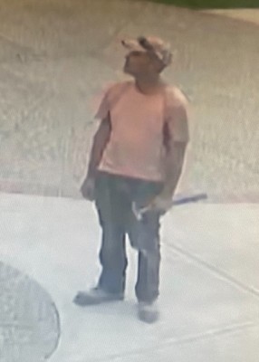 Calgary police are looking for a man alleged to have defaced a church statue. He is described as around 5’11” tall with a slim build. Police say he may have tattoos on his left arm. He was last seen wearing an orange T-shirt, a baseball cap, sunglasses, dark construction pants, and construction boots.