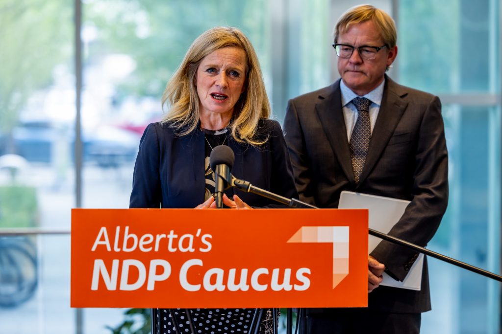 Alberta's NDP leader Rachel Notley, left, speaks at a press conference with MLA David Eggen