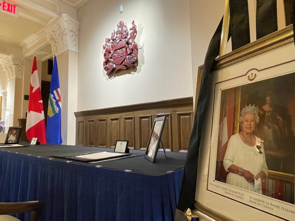 A desk is set-up at the McDougall Centre in honour of the late Queen Elizabeth II in Calgary