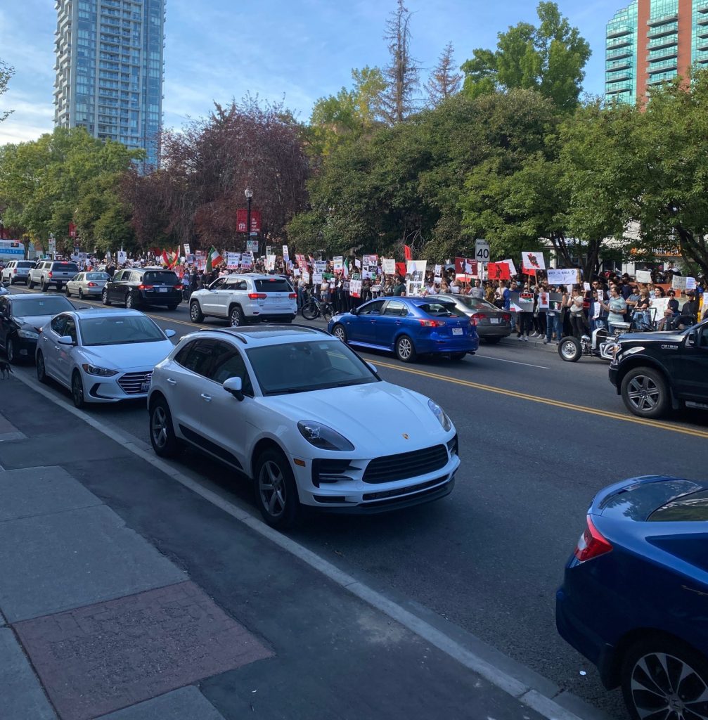 A picture of a rally in Calgary to support Iranian women's rights