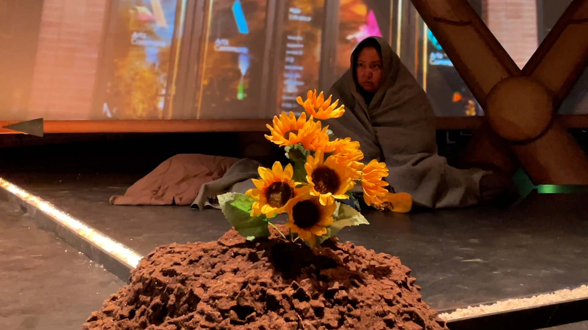 Janine Owl Child performing in O’kosi on stage at Pumphouse Theatre.