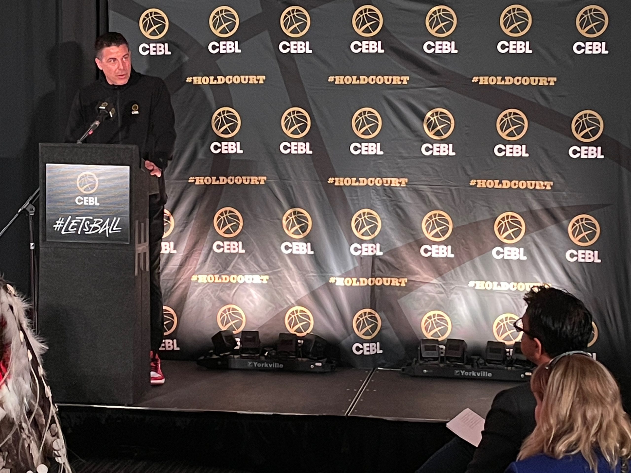 Co-Founder of the CEBL Mike Morreale speaks at the reveal of the Calgary Surge basketball team name and logo