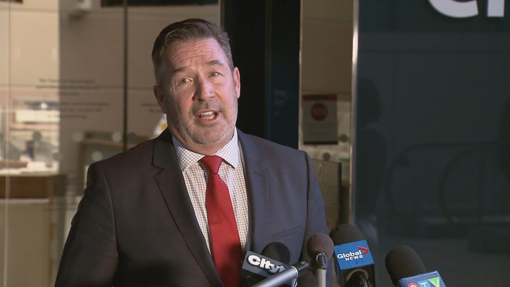 Ward 13 Councillor Dan McLean speaks with reporters outside City Hall in Calgary