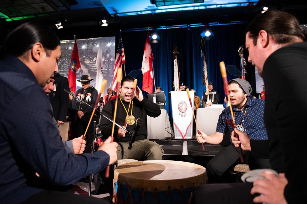 Indigenous drummers perform a song during the official start of the Assembly of First Nations Special Chiefs Assembly in Ottawa