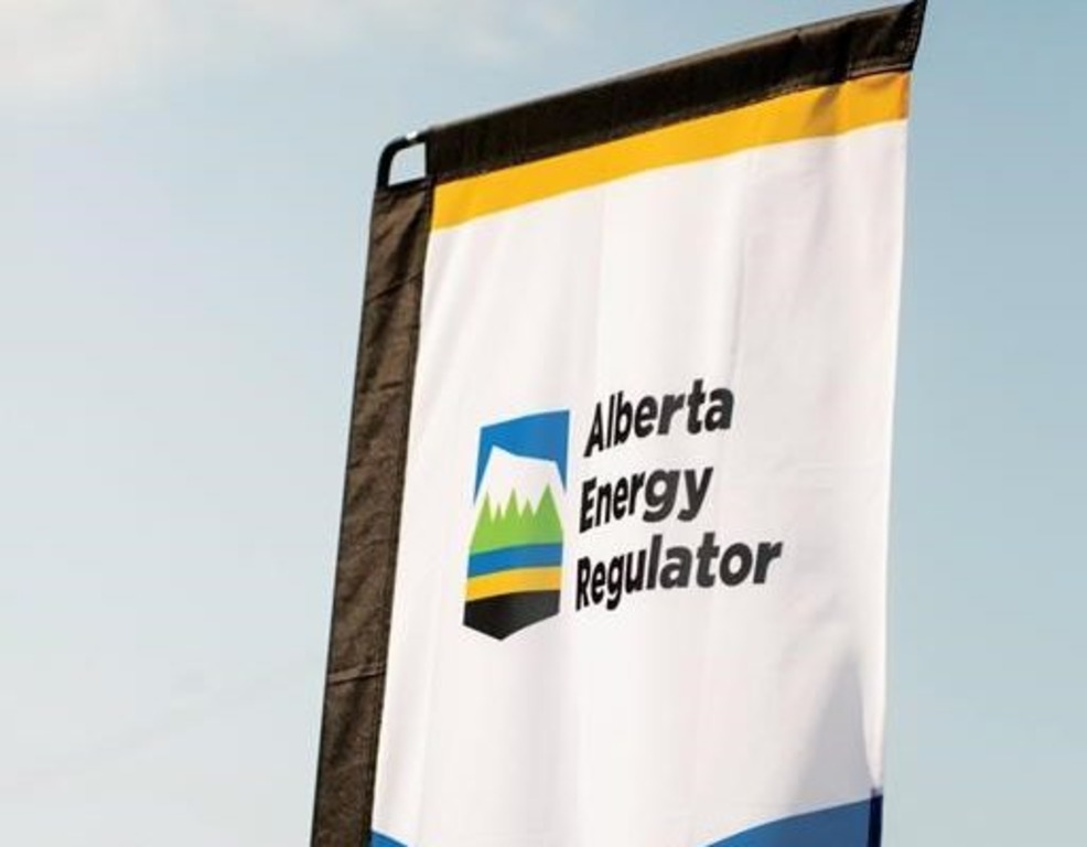 The Alberta Energy Regulator logo is seen on a flag at the opening of the regulator's office in Calgary