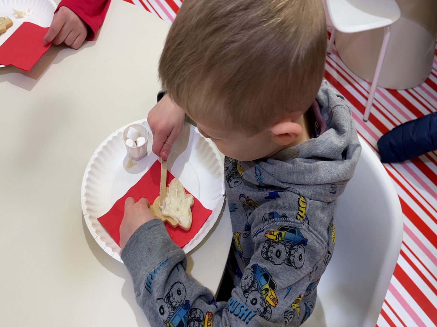 A child decorates cokies at Southcentre Mall in Calgary