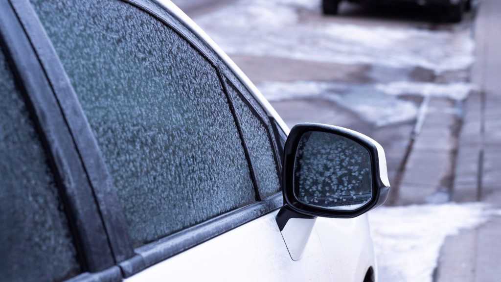 A car has frost plastered on its windows in Calgary