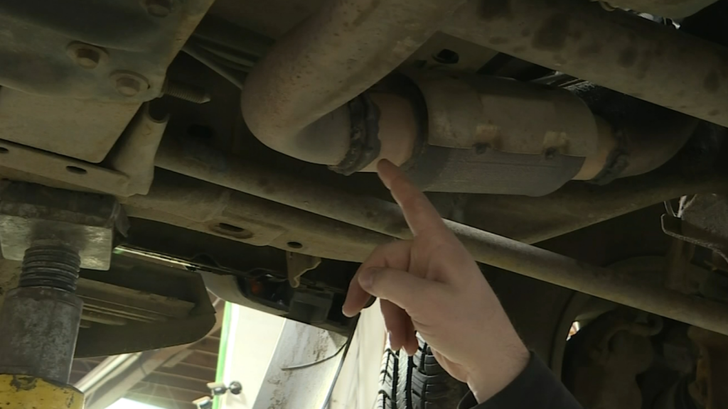 A catalytic converter on a vehicle