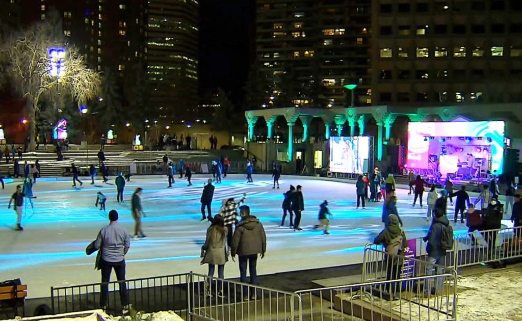 People skate on Olympic Plaza amid Chinook Blast in Calgary