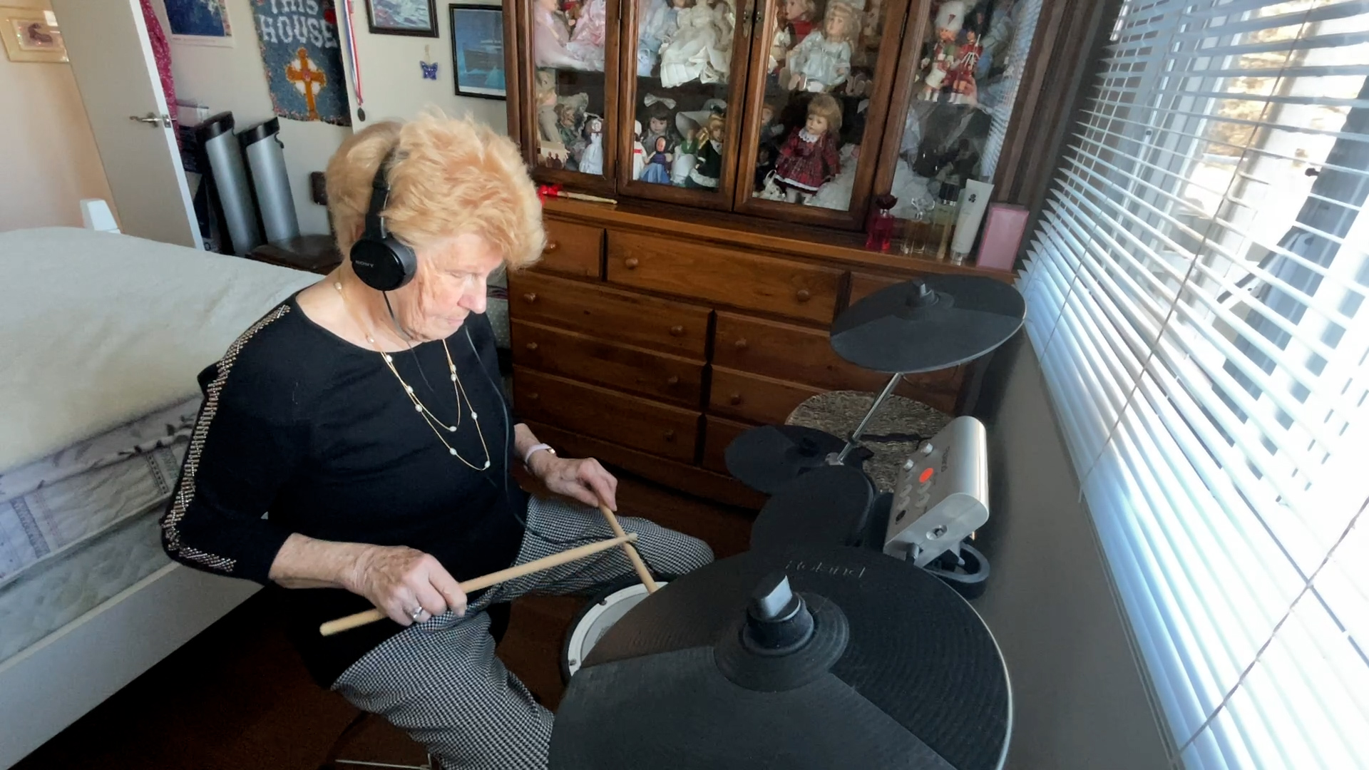 Inger Pederson plays on her electronic drum set in Calgary