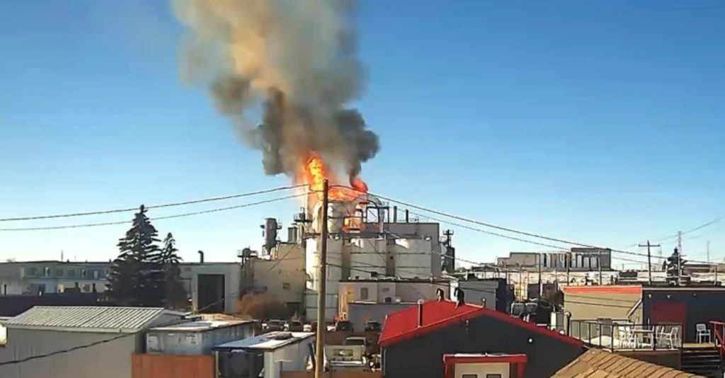 A screenshot from a video that captured the fire at the Fire at Alberta Distillers Limited in Calgary