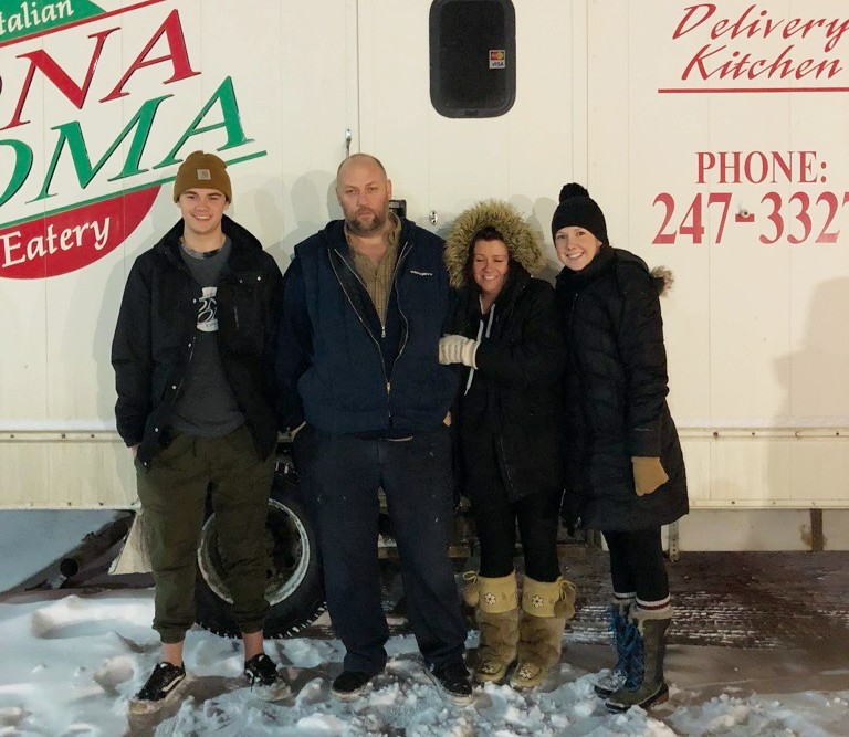Colby Graham, left, poses for a photo alongside his father Shawn, centre-left, his mother Cindy, centre-right, and his sister Mackenzie in Calgary