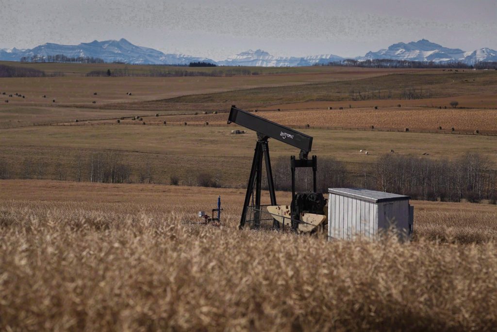 A decommissioned pumpjack is shown at a well head on an oil and gas installation near Cremona, Alta