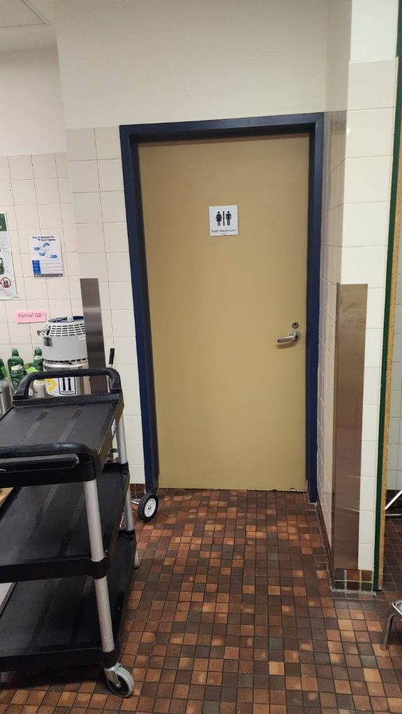 A bathroom inside a room labeled "Staff Access Only," where Bradford Mistaken Chief's mother stays while at the Tom Baker Cancer Centre in Calgary