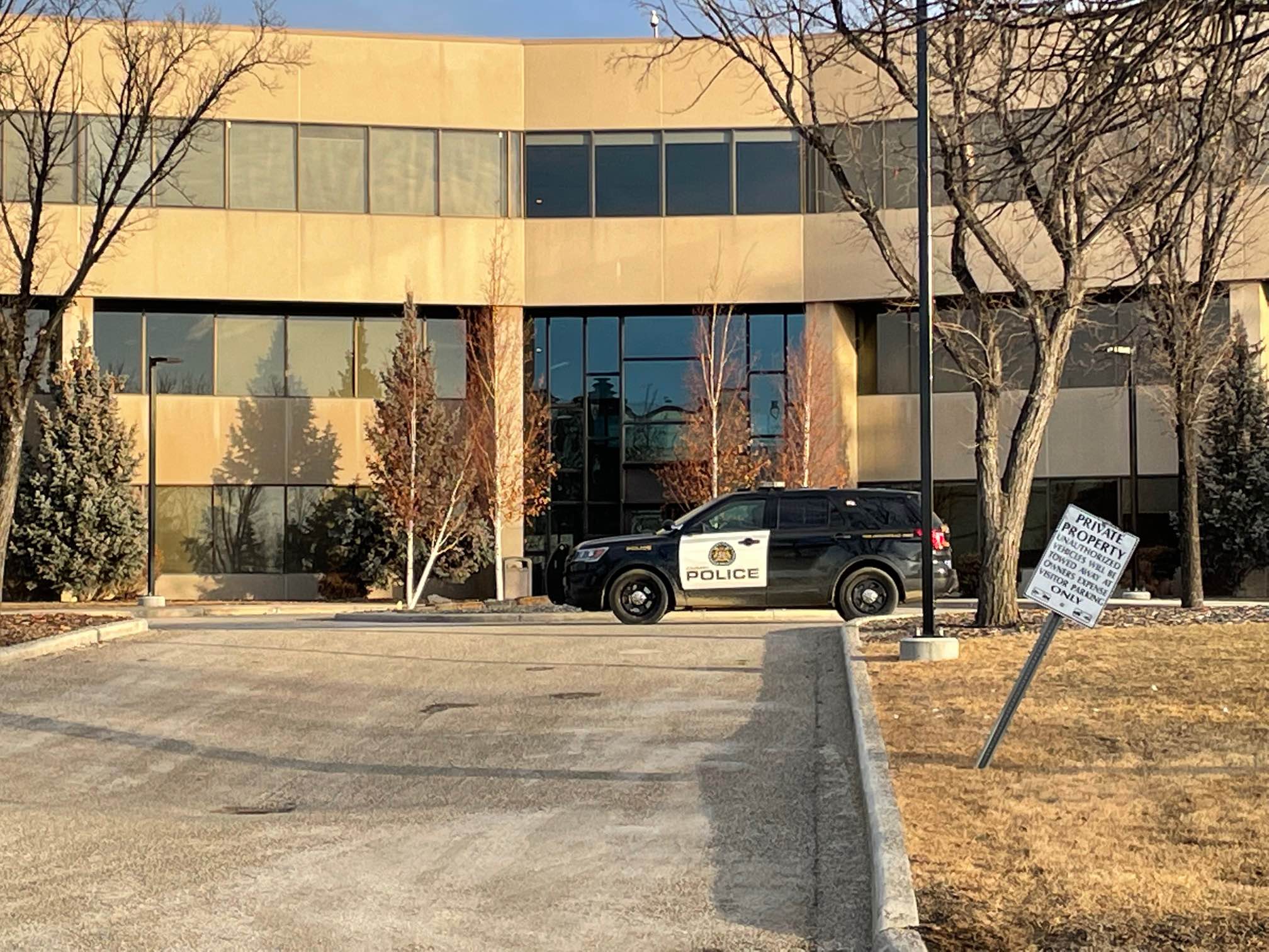 A Calgary Police Service vehicle in front of a commercial building in southeast Calgary