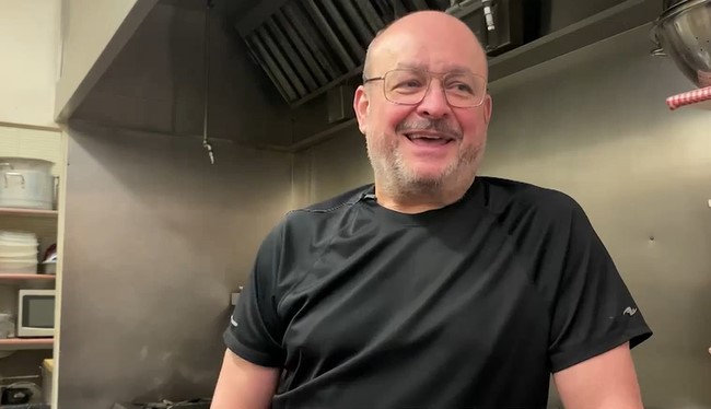 Janos Jonas laughs amid an interview in the kitchen of Jonas' Restaurant in Calgary
