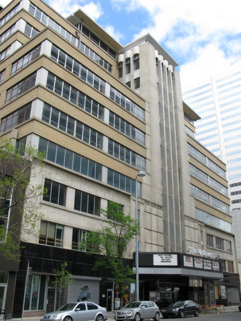 Art Moderne style building with a prominent geometrical frontispiece and a façade of strip windows and brick spandrels. One of the earliest and best example of a Moderne office building in Calgary