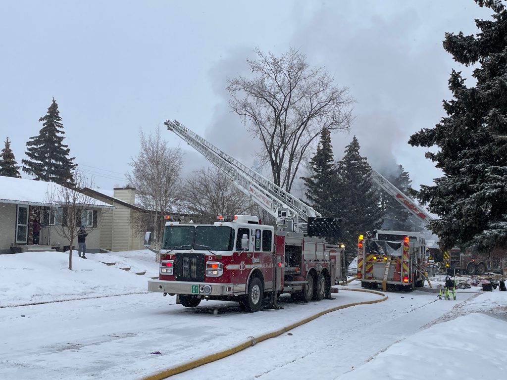 Calgary fire trucks at a home that was caught in a gas explosion in Marlborough in northeast Calgary