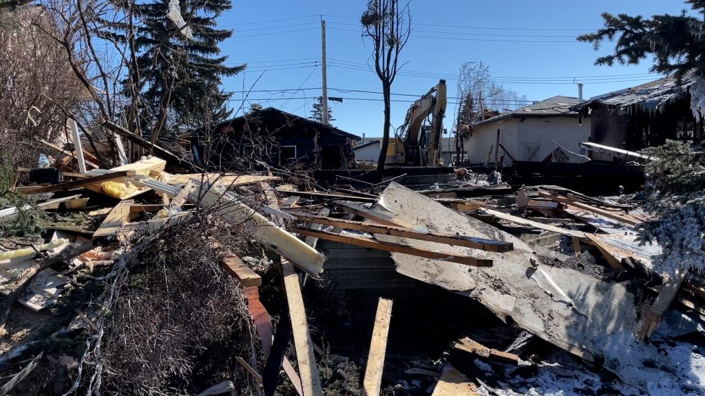 The debris of a home caught in an explosion in northeast Calgary