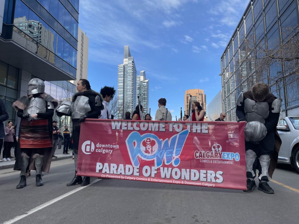 A banner at the start of the Parade of Wonders in Calgary on Friday, April 28, 2023. (Logan Stein, CityNews image)