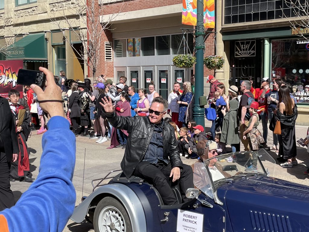 Robert Patrick, who appeared as the T-1000 in Terminator 2 waves to fans at the Calgary Parade of Wonders on Friday, April 28, 2023. (Todd Kaufman, CityNews image)