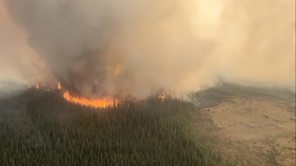 The east side of the Paskwa fire burns in the High Level Forest Area district of Alberta