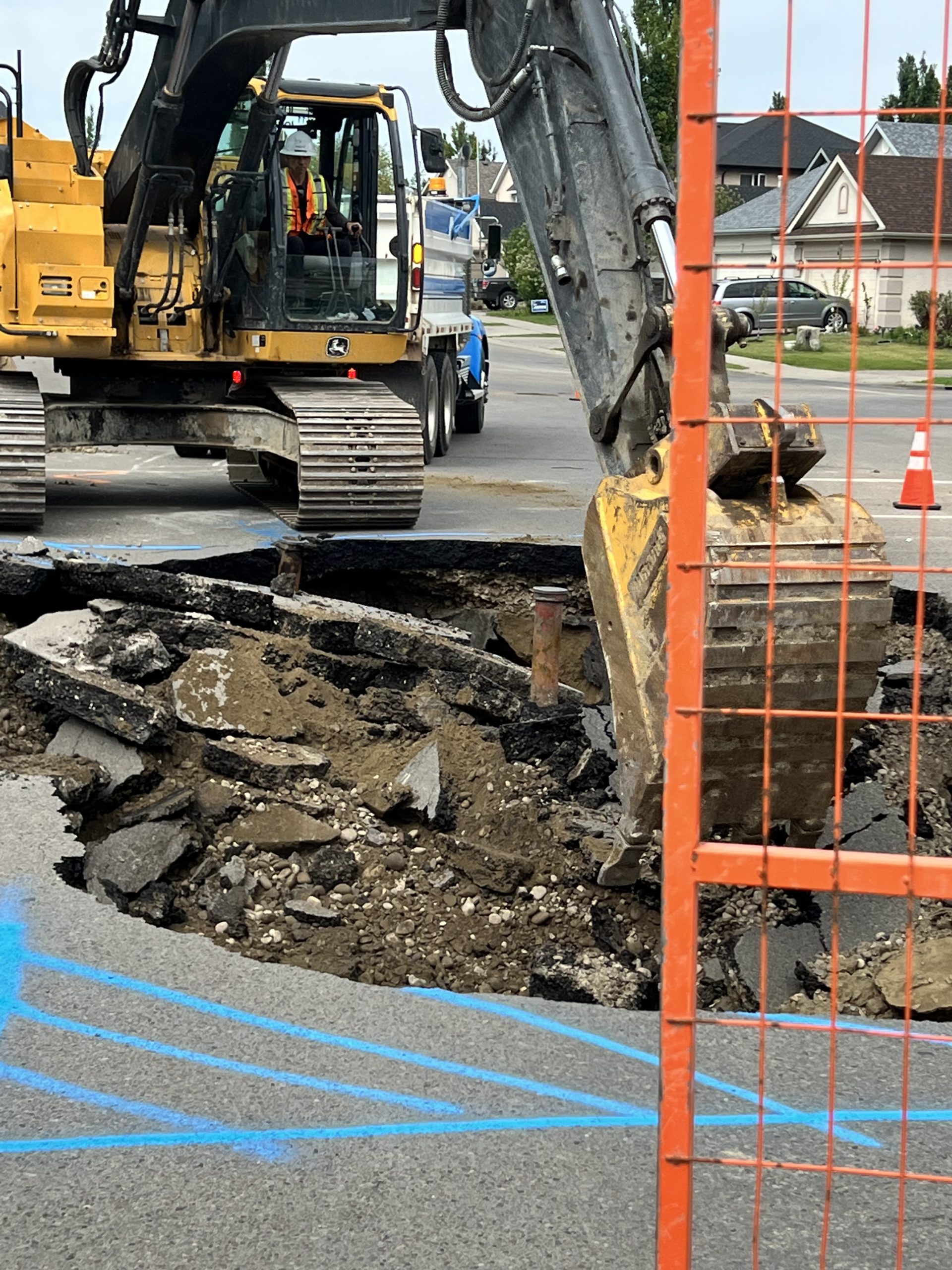 City crews on scene of a sinkhole in the southeast community of Cranston on Wednesday, May 24, 2023. (Shilpa Downton, CityNews image)