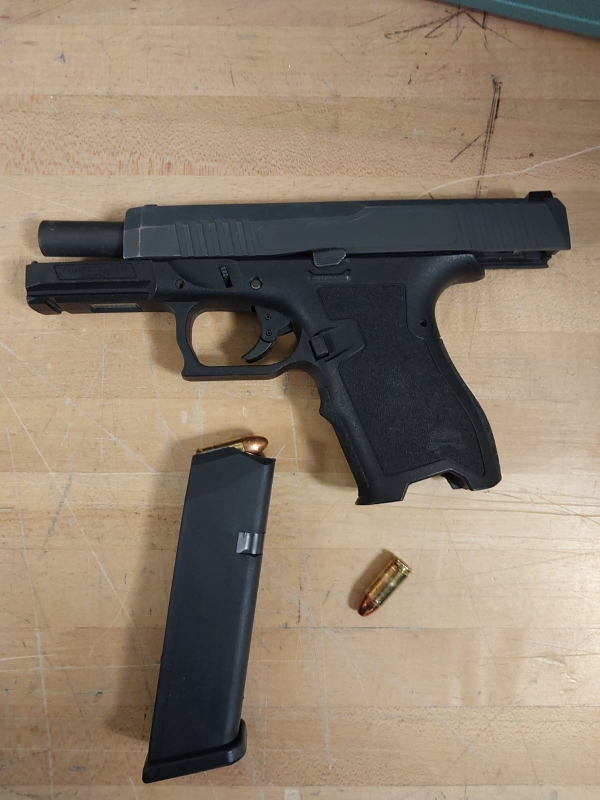 A loaded 9mm handgun seized by police