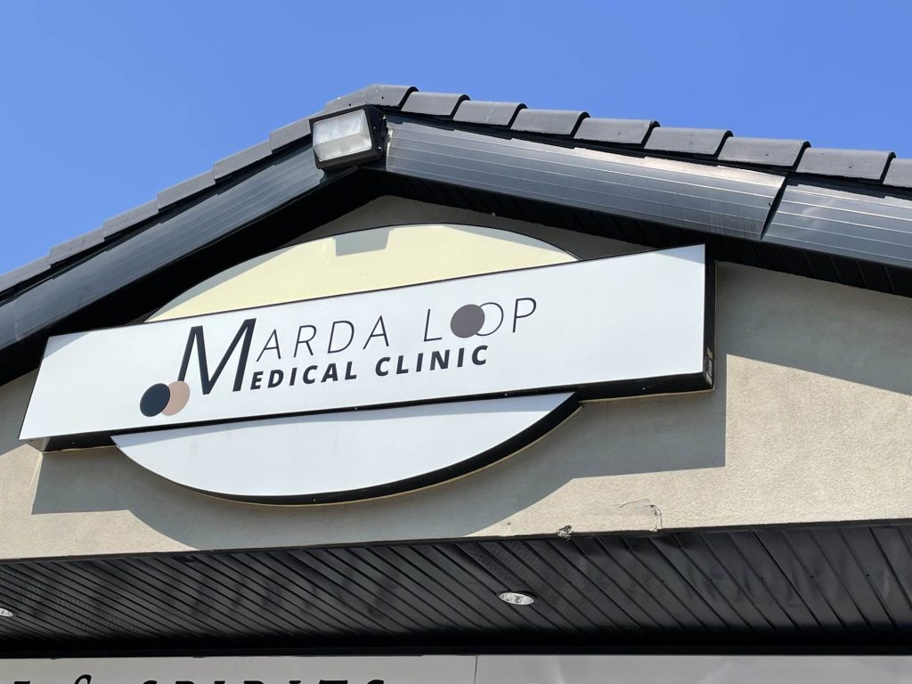 The sign of the Marda Loop Medical Clinic in southwest Calgary