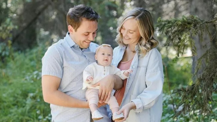 The Laser family, Adam, left, Amelia, centre, and Jordan, pose for a photo