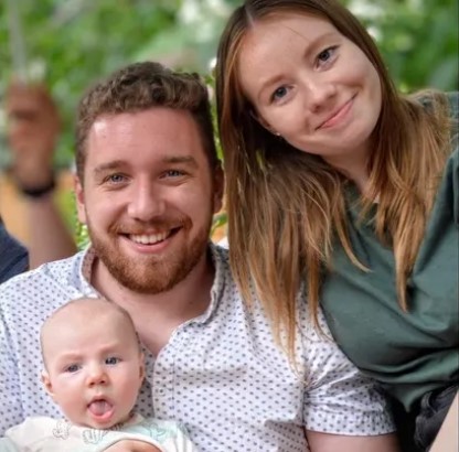 Jacob Brown, centre, with Ezra, left, and his wife Alex Brown