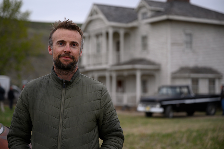 Trevor Smith poses for a photo in the outdoors