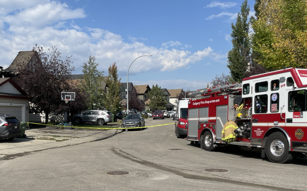 A Calgary Fire Department truck near a home on Evansbrooke Way that caught fire in Calgary