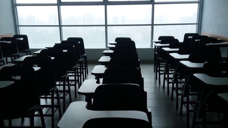 An empty classroom is shown in this undated photo. UNSPLASH/Ruben Rodriguez