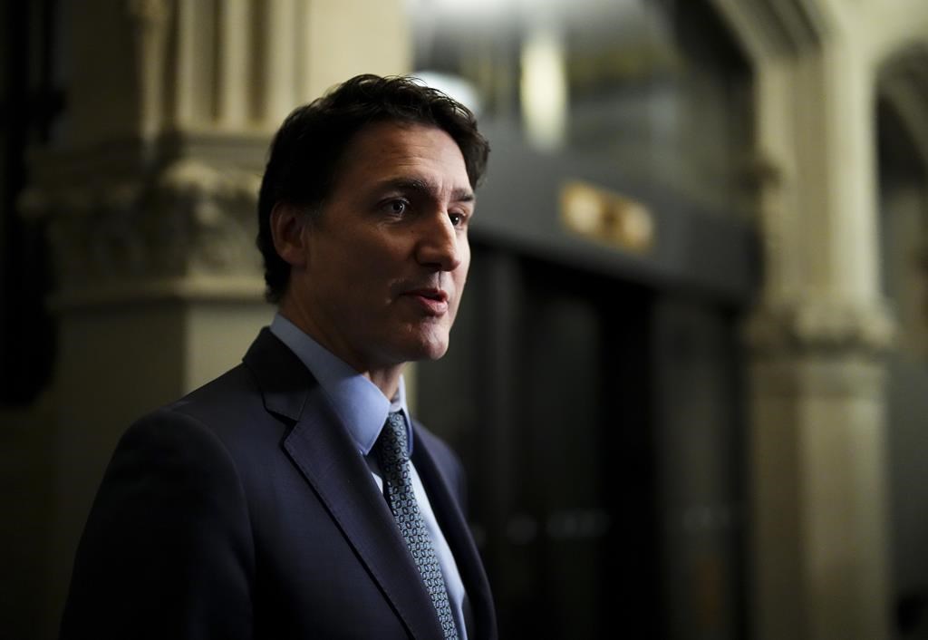 Prime Minister Justin Trudeau arrives to a caucus meeting on Parliament Hill in Ottawa on Wednesday, Oct. 4, 2023.