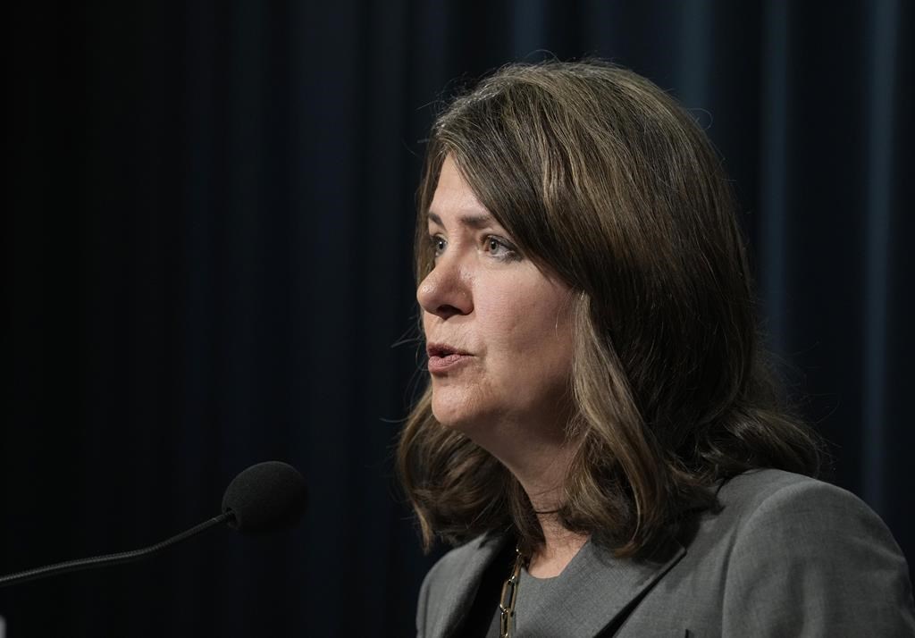 Alberta Premier Danielle Smith speaks during a news conference in Calgary on Friday, Oct. 13, 2023.