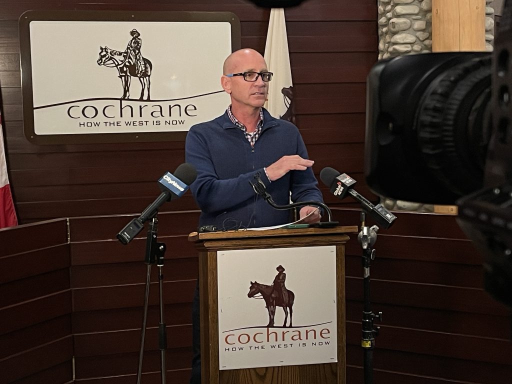 Cochrane Mayor Jeff Genung speaks at a press conference on Tuesday, Oct. 24, 2023. The town has declared a state of local emergency due to low levels in its water reservoirs after a water and sewer line break over the weekend.